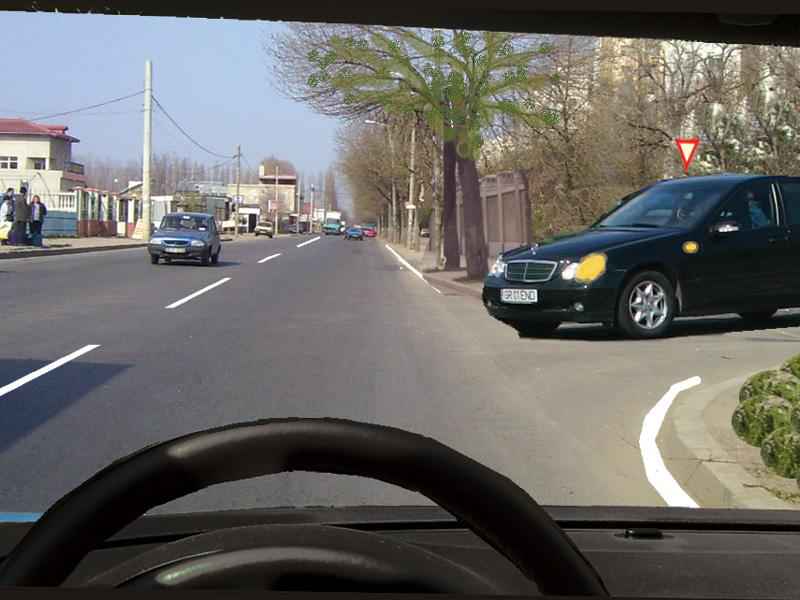 Trebuie să acordaţi prioritate autoturismului negru dacă acesta virează la stânga?