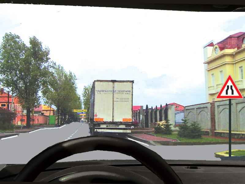 Camionul este staționat. Cine încalcă legea dacă încercați să-l depășiți?